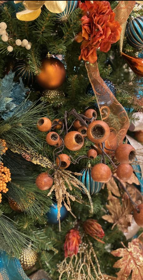 Unexpected colors and textures add a lot of depth and interest to a Christmas Tree